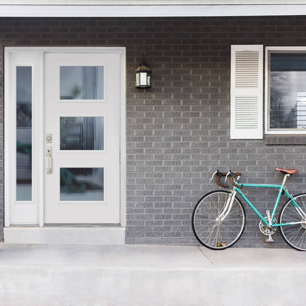White entry door with large glass panels and one sidelite.