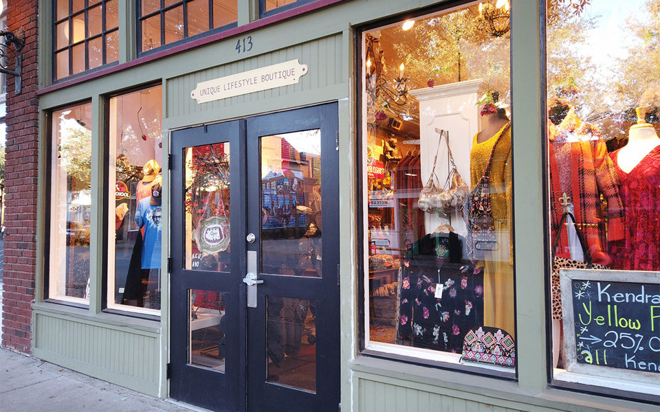 Epiphany storefront with pale green and black color scheme, located in Bishop Arts District.