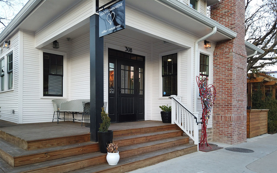 Good Companions store in renovated craftsman style house with black doors and windows, located in Bishop Arts District.