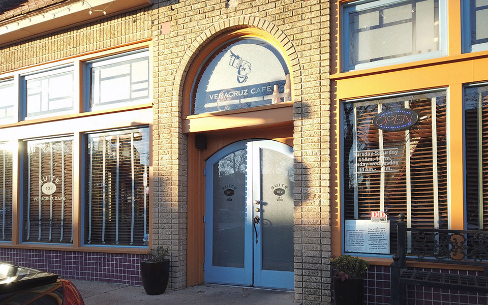 Blue arched french doors on entrance to Veracruz Cafe in Bishop Arts District.