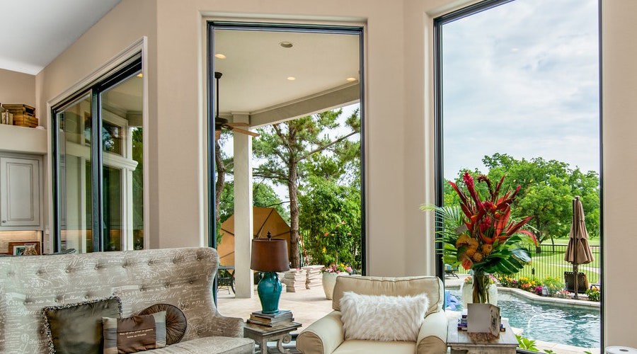 large picture windows with patio view