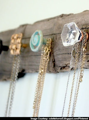 Repurposed wood and door knobs for form and function.