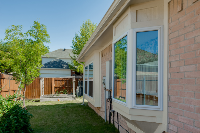 pink-brick-windows-with-white-bay-windows