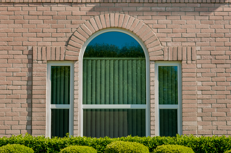 pink-brick-with-white-replacement-windows