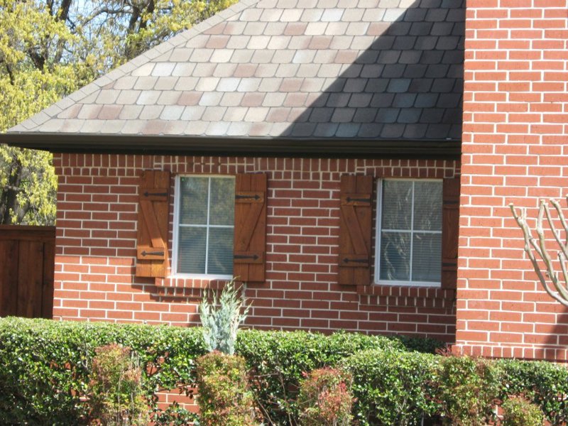 white-builder-grade-aluminum-windows-with-grids