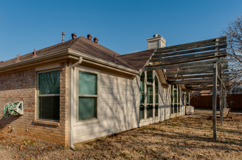 brennan-traditions-backyard-view-with-brick-and-vinyl