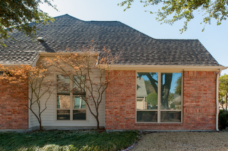 brennan-traditions-backyard-view-of-vinyl-windows-with-screen