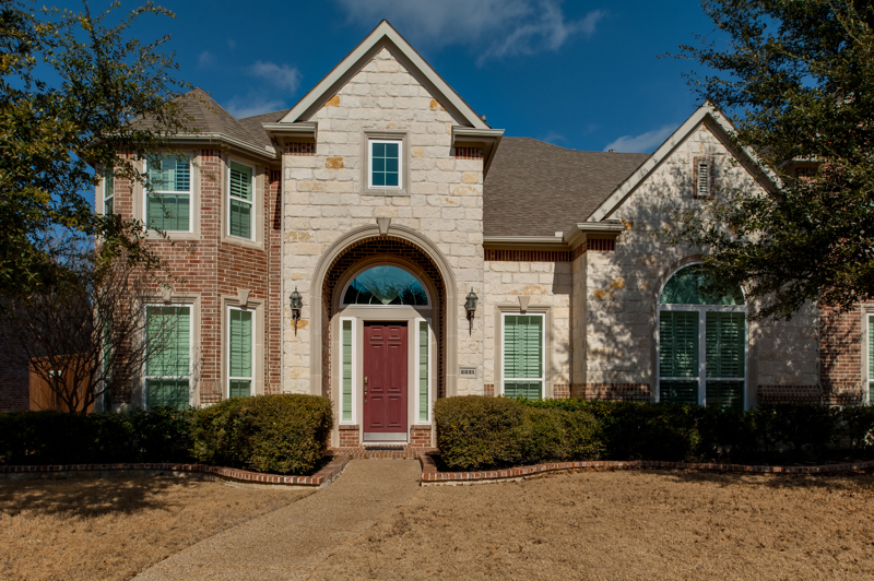 brennan-traditions-2-story-home-red-door