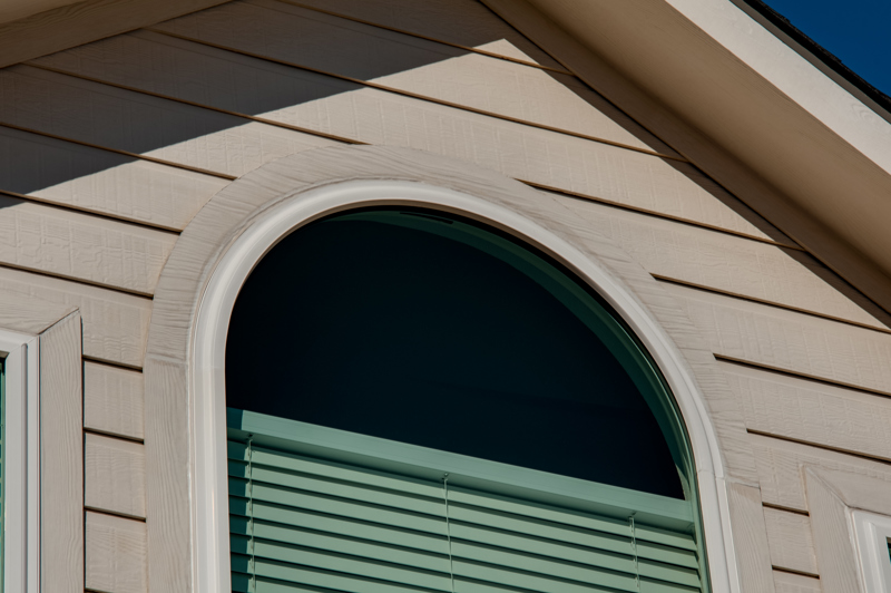 brennan-traditions-with-specialty-window-on-second-floor