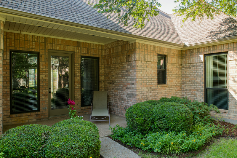 brennan-traditions-backdoor-porch-with-black-trim-windows