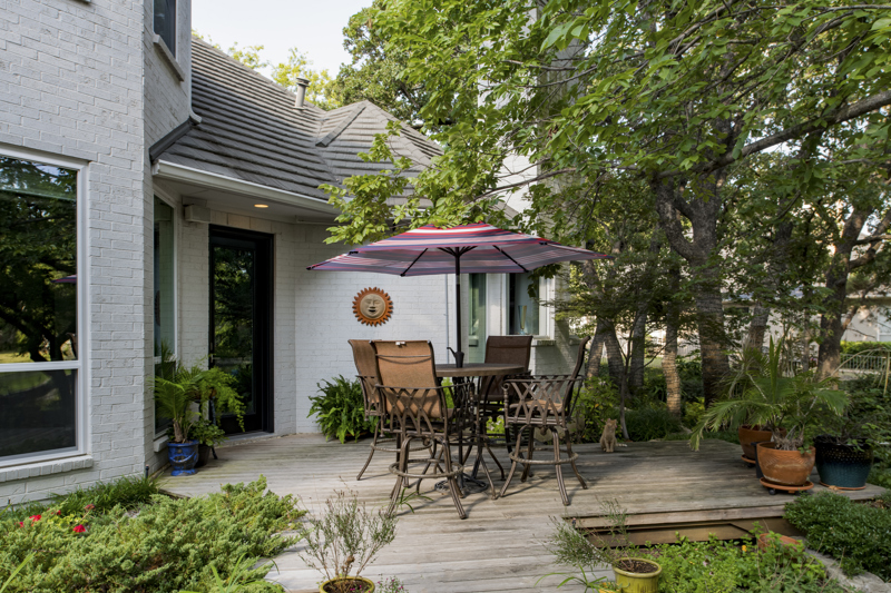 patio-view-of-black-hinged-provia-doors
