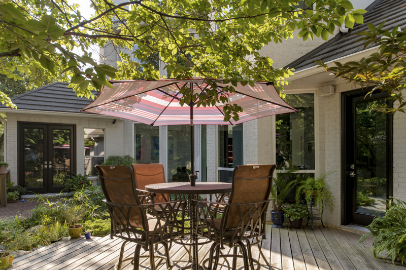 patio-view-with-french-door-and-hinged-provia-doors