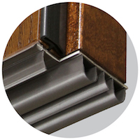 Embarq door's custom designed sweep with multiple layers for thermal barriers.