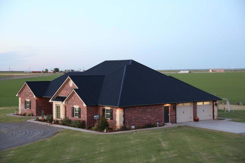 Black u panel steel roof.