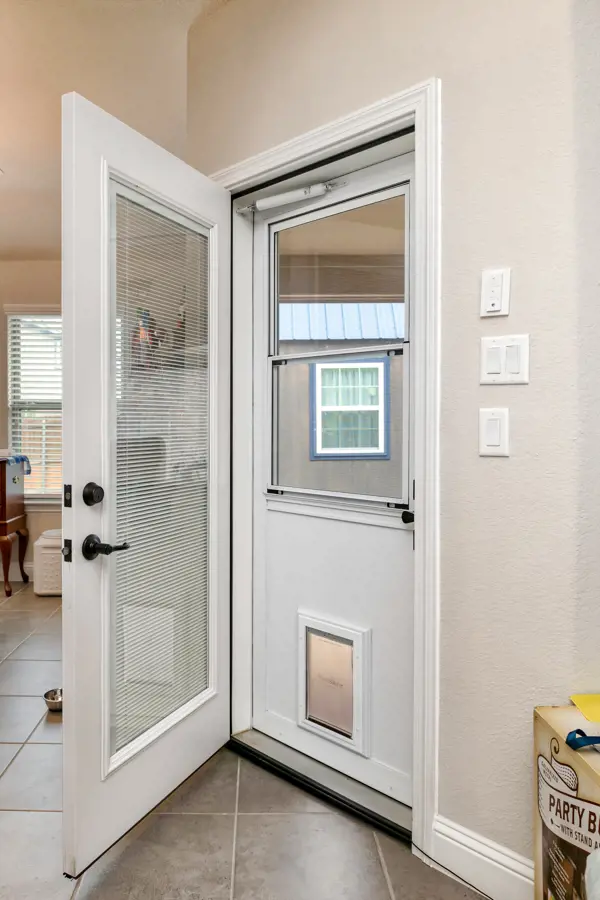 Storm Door with Pet Door